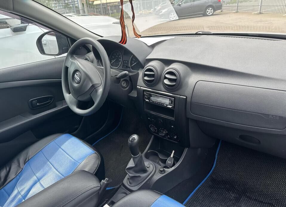 Nissan Almera 1.6 MT (102 л.с.)
