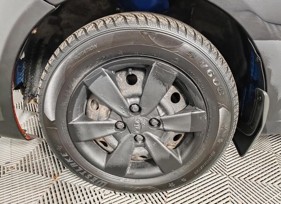 Kia Rio, II Рестайлинг 1.4 MT (97 л.с.)