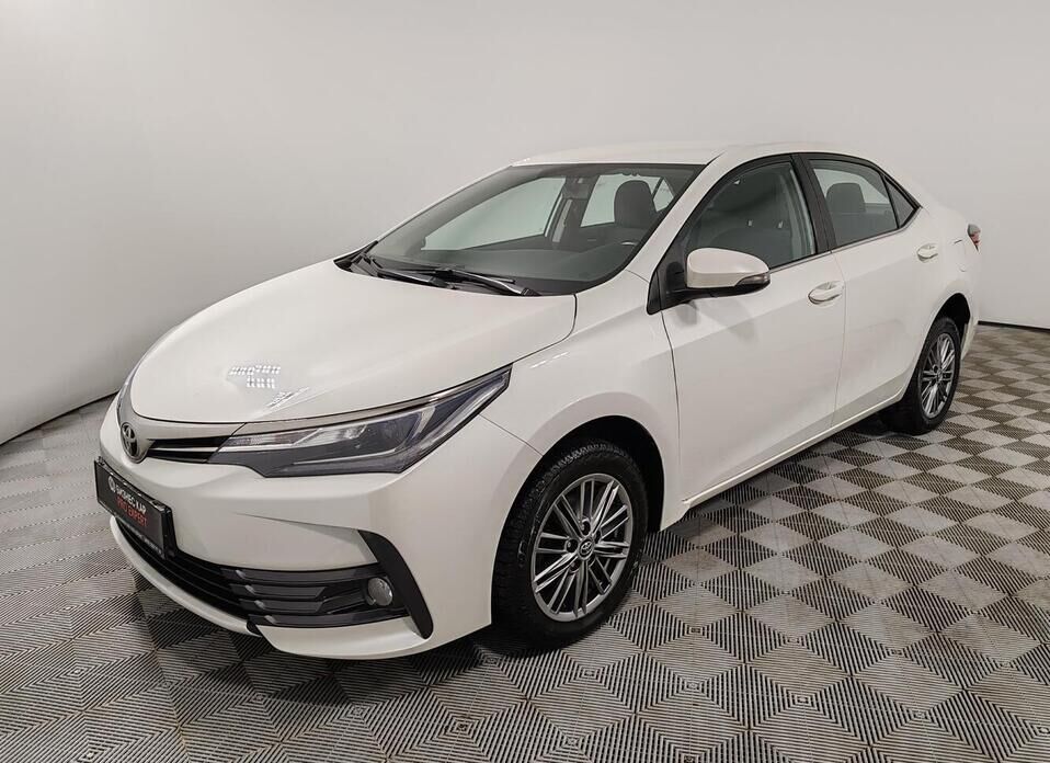 Toyota Corolla, XI (E160, E170) Рестайлинг 1.6 CVT (122 л.с.)