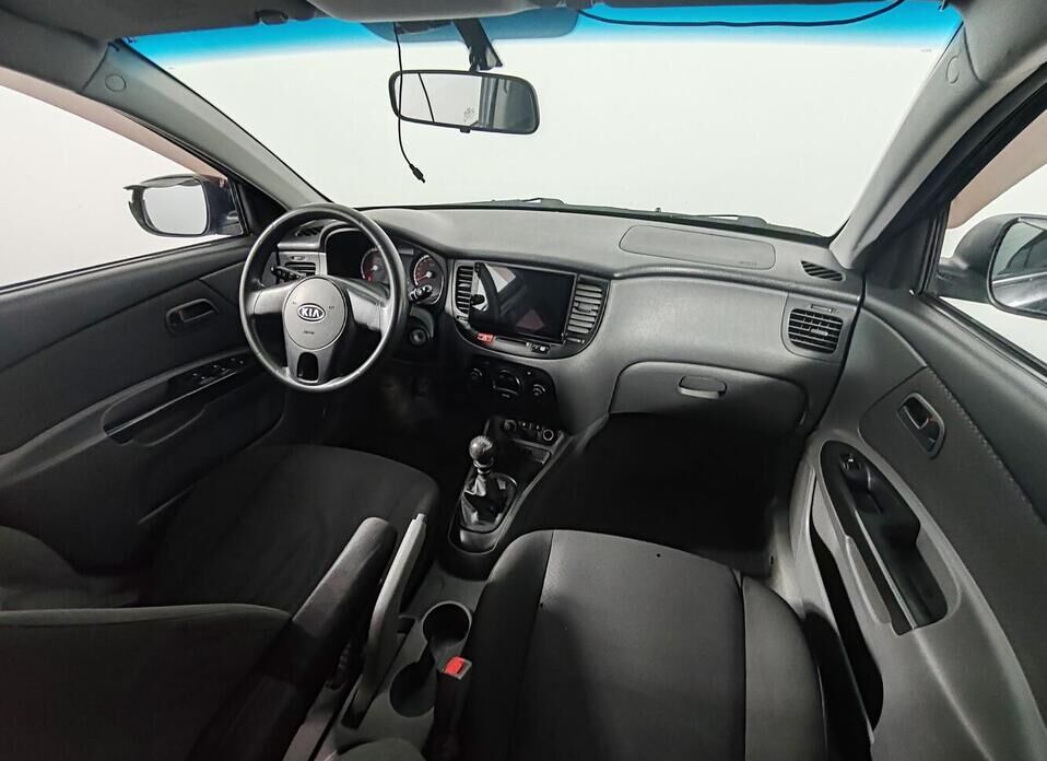 Kia Rio, II Рестайлинг 1.4 MT (97 л.с.)
