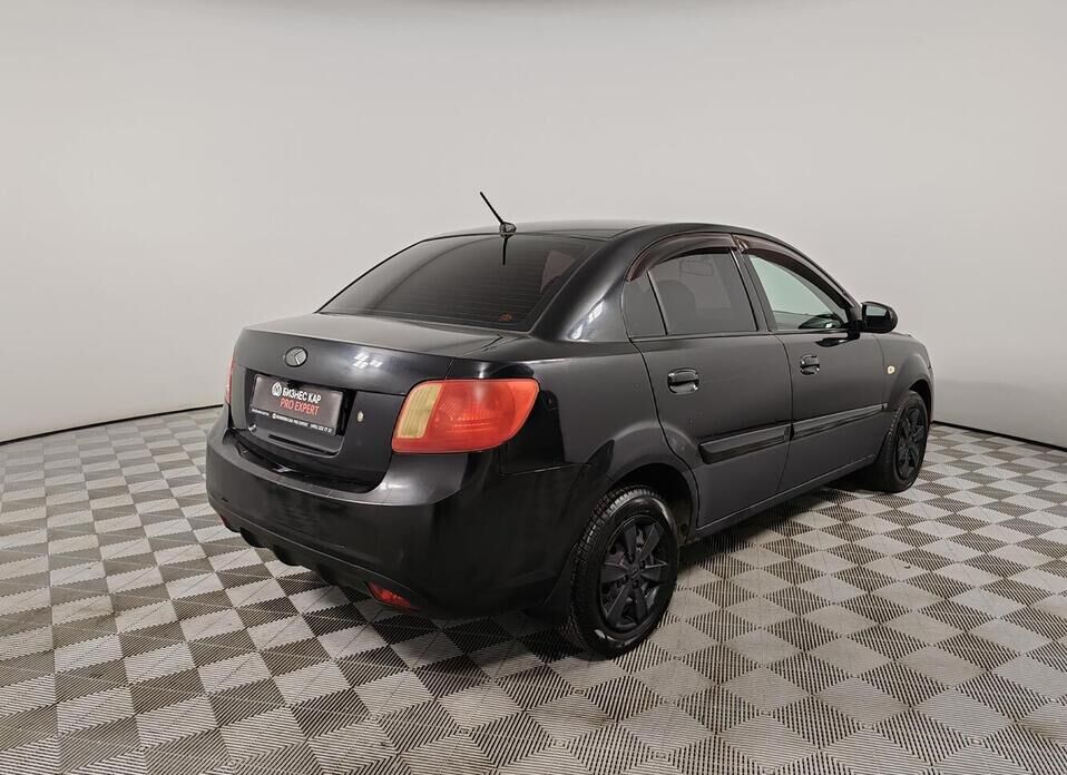 Kia Rio, II Рестайлинг 1.4 MT (97 л.с.)
