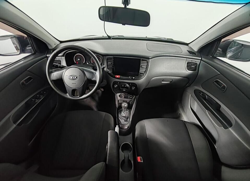 Kia Rio, II Рестайлинг 1.4 MT (97 л.с.)
